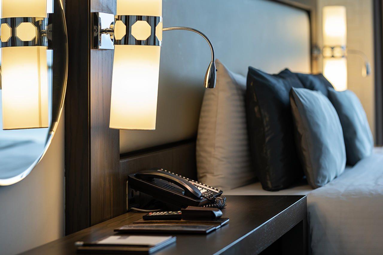 Royal M Al Aqah Beach Resort By Gewan Eksteriør billede A telephone in a hotel room