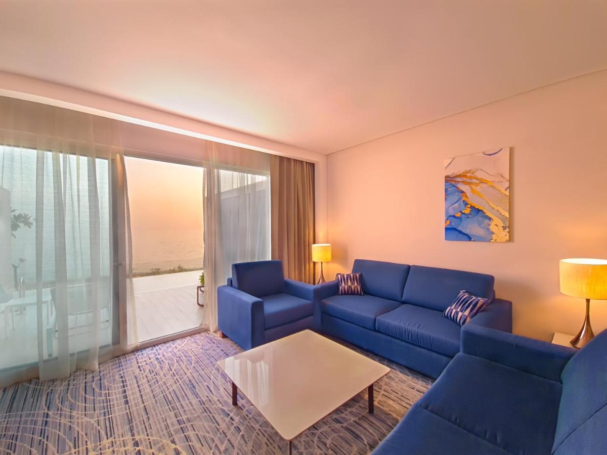 Royal M Al Aqah Beach Resort By Gewan Eksteriør billede Living room